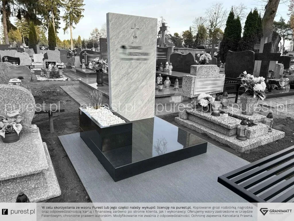 nagrobek urnowy z donicą i białą tablica z krzyżem
